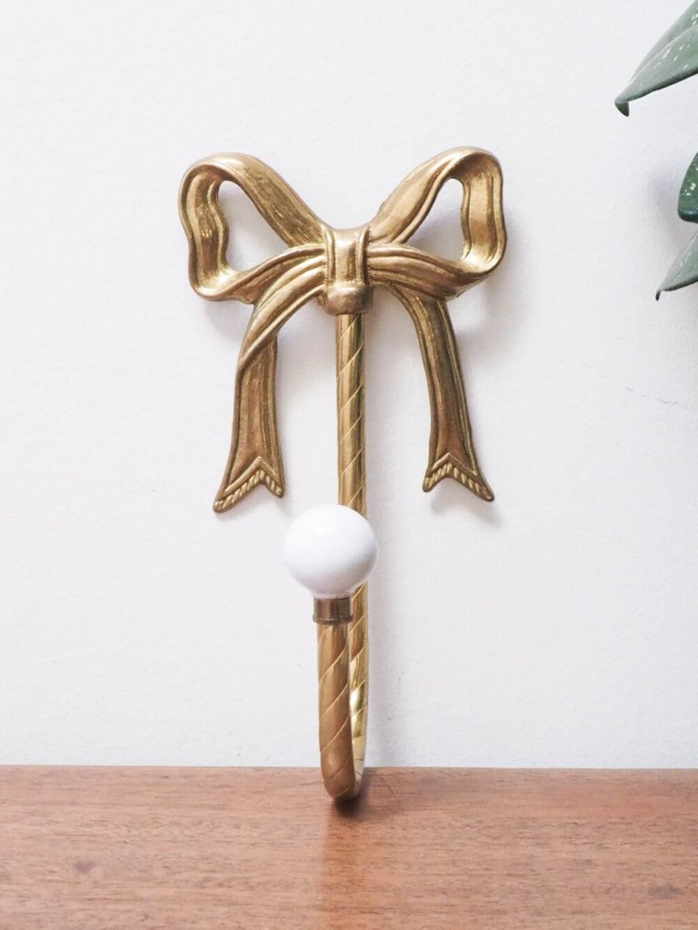 Vtg Brass Bow Coat Hook with White Knob - Twisted Brass Wall Hook